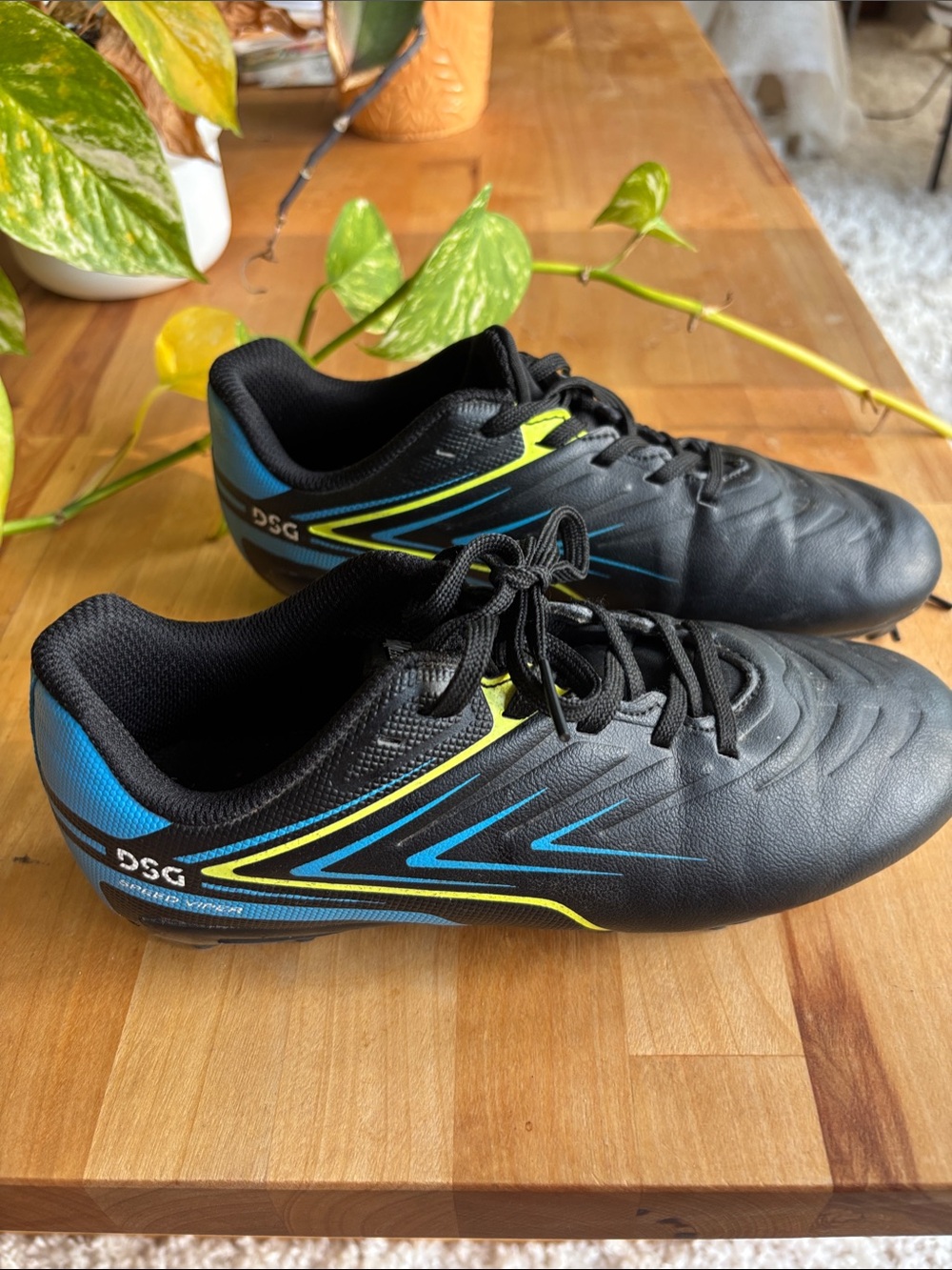 DSG Kids Speed Viper Black Soccer Cleats with Blue & Yellow Accents